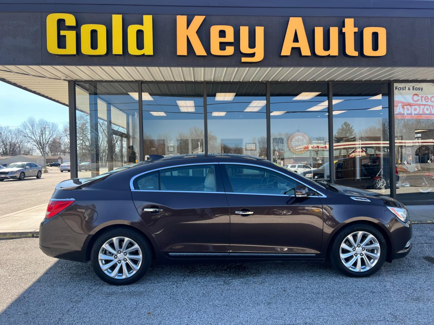 2015 Dark Chocolate Buick LaCrosse Leather Package (1G4GB5G31FF) with an 3.6L V6 DOHC 24V FFV engine, 6-Speed Automatic transmission, located at 1633 W Kimberly, Davenport, IA, 52806, (563) 323-5341, 41.559456, -90.598732 - Photo#0